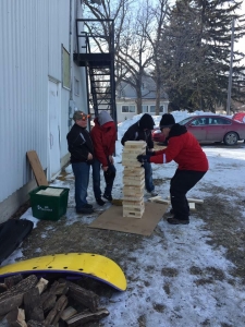 A few people try their hand at giant Jenga