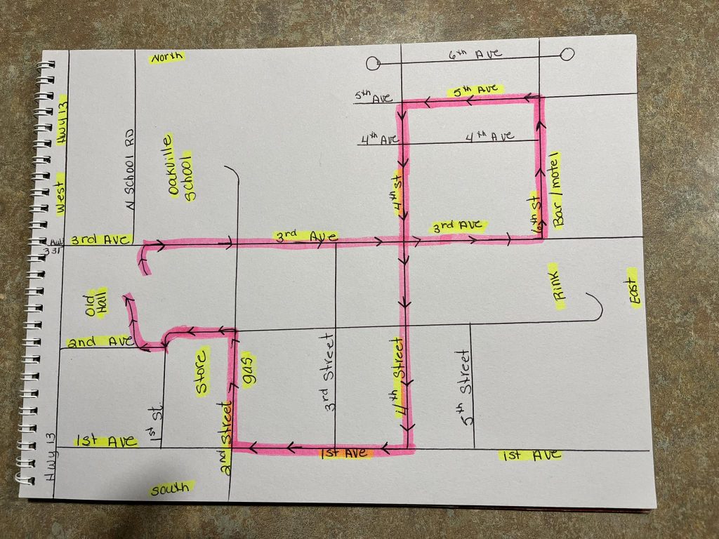 A map of the santa claus parade route. The route starts at the old hall, goes east on 3rd ave, turns north onto 6th st, then west onto 5th ave, south on 4th st, west on 1st ave, north on 2nd st, west on 2nd ave, then ends back at the hall. 